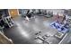 Well-equipped gym with weights, treadmills, and fitness equipment at 914 Caribbean Dr, Davenport, FL 33897
