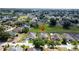 A residential area featuring houses with pools and a green location marker at 925 Montana Ave, Davenport, FL 33897