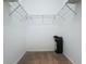 Walk-in closet with wire shelving, ready for easy organization and storage at 925 Montana Ave, Davenport, FL 33897