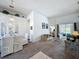 Open-concept living room and dining area, perfect for entertaining guests at 925 Montana Ave, Davenport, FL 33897