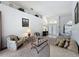 Bright and airy living room with double doors, high ceilings and a seamless flow at 925 Montana Ave, Davenport, FL 33897
