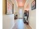 Inviting entryway featuring neutral-colored walls, tile flooring, and decorative accents that add character at 105 Palazzo Ln, Kissimmee, FL 34759