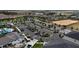 Aerial view of community, parking lot, and amenities at 1058 Splash Shot Pl, Davenport, FL 33896