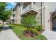 Attractive exterior with well-maintained landscaping, balconies, and architectural details at 1231 Wright Cir # 108, Kissimmee, FL 34747