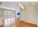 Cozy living space with hardwood floors and large French doors offering ample natural light at 1231 Wright Cir # 108, Kissimmee, FL 34747