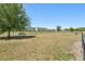 Large dog park with benches, trees, and fencing for the community at 12379 Turtle Grass Dr, Orlando, FL 32824