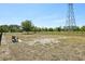 Large, fenced dog park with benches, providing a secure space for pets to play at 12379 Turtle Grass Dr, Orlando, FL 32824
