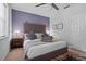 Comfortable bedroom featuring plush bedding, stylish decor, and a soothing color palette at 1303 Artisan E Ave, Celebration, FL 34747