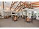 Bright clubhouse interior with a fireplace, television, and comfortable lounge seating at 1303 Artisan E Ave, Celebration, FL 34747
