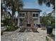 Outdoor fireplace lounge area with comfortable seating for relaxation and socializing at 1303 Artisan E Ave, Celebration, FL 34747