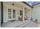 Cozy patio perfect for outdoor entertaining with seating and tranquil views at 1303 Artisan E Ave, Celebration, FL 34747