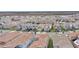An aerial view showcases an expansive housing development with neatly arranged homes in a grid-like pattern at 13282 Bromborough Dr, Orlando, FL 32832