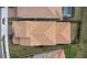 Aerial view of the home featuring the terracotta roof and meticulously landscaped backyard at 13282 Bromborough Dr, Orlando, FL 32832