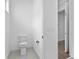 Neat half bath with white walls and ceramic tile flooring at 13282 Bromborough Dr, Orlando, FL 32832