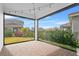 Outdoor patio space with brick flooring, string lights and a picturesque backyard view at 13282 Bromborough Dr, Orlando, FL 32832