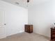 Unfurnished bedroom with neutral carpet and a door to the hall, and dresser visible at 1379 Winter Gray Cir, Deltona, FL 32738