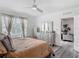 Inviting bedroom featuring stylish decor, and large windows with natural light at 1379 Winter Gray Cir, Deltona, FL 32738
