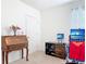 Bright home office featuring a charming writing desk and modern computer setup for work and creativity at 1379 Winter Gray Cir, Deltona, FL 32738