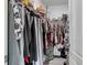 Spacious walk-in closet with ample storage and organization for clothing and accessories at 1379 Winter Gray Cir, Deltona, FL 32738