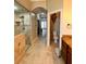 Bathroom featuring a walk-in shower, tile flooring, and a separate water closet at 1407 Water Lilly Ln, Kissimmee, FL 34744