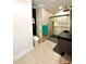 Bathroom featuring a glass-enclosed shower, modern vanity, and sleek fixtures at 1407 Water Lilly Ln, Kissimmee, FL 34744