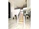 Interior view of home featuring marble floors, a staircase, second floor balcony and recessed lighting at 1407 Water Lilly Ln, Kissimmee, FL 34744