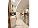 Compact kitchen featuring modern appliances, white cabinetry, and a bright and airy atmosphere at 1407 Water Lilly Ln, Kissimmee, FL 34744