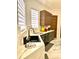 Modern kitchen sink area featuring sleek countertops, and cabinetry at 1407 Water Lilly Ln, Kissimmee, FL 34744