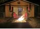 Hurricane shelter with a fire pit, perfect for enjoying cozy evenings outdoors at 1849 Kings Point Blvd, Kissimmee, FL 34744