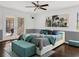 Inviting bedroom features comfortable furnishings and patio access at 1849 Kings Point Blvd, Kissimmee, FL 34744
