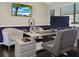This office features a sleek sit-stand desk, dual monitors, and accent lighting at 1849 Kings Point Blvd, Kissimmee, FL 34744