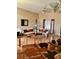Inviting living room with comfortable seating, vaulted ceilings, a ceiling fan, and a warm, neutral color palette at 1920 Triumfo Cir, Kissimmee, FL 34744