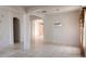 Open concept living space featuring arched doorways, columns and tile floors at 1948 Bridgeview Cir, Orlando, FL 32824