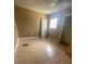 Bedroom featuring wood flooring, a closet, and a window at 228 Scottsdale Sq # 228, Winter Park, FL 32792