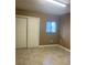 Bedroom featuring a closet and a window at 228 Scottsdale Sq # 228, Winter Park, FL 32792