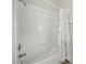 Clean bathroom with a shower/tub combo and a white shower curtain at 2374 Eagle Trace Dr, Kissimmee, FL 34746