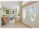 Inviting entry leading into a comfortable living area with plush seating and stylish decor at 2374 Eagle Trace Dr, Kissimmee, FL 34746