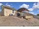 A wooden pergola adds character to a backyard with a tiered deck and room for outdoor enjoyment at 2487 Empress Dr, Kissimmee, FL 34741
