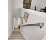 Carpeted staircase leading down, adorned with framed art on the wall at 2487 Empress Dr, Kissimmee, FL 34741