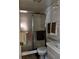 Bathroom featuring glass enclosed shower, toilet, and sink with vanity at 2659 Crown Ct # 11, Kissimmee, FL 34741