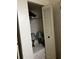 Bedroom closet features lamps and extra storage with bi-fold doors at 2659 Crown Ct # 11, Kissimmee, FL 34741