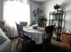 Bright dining room featuring a table and four chairs, large window, and decor at 2659 Crown Ct # 11, Kissimmee, FL 34741