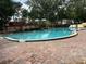 Exterior shot of a pool with cool blue water surrounded by brick at 2804 N Powers Dr # 31, Orlando, FL 32818