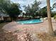 Exterior shot of a pool area with a brick deck at 2804 N Powers Dr # 31, Orlando, FL 32818