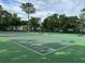 Exterior shot of a tennis court with a net at 2804 N Powers Dr # 31, Orlando, FL 32818