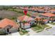 A beautiful home with orange tile roof and well-maintained landscaping at 301 Rosso Dr, Davenport, FL 33837