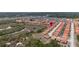 Aerial view of community with orange tile roofs in a developed neighborhood at 301 Rosso Dr, Davenport, FL 33837