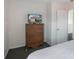 A bedroom with a television and a view of the neighborhood at 301 Rosso Dr, Davenport, FL 33837