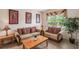 Cozy living room features comfortable sofas, decorative pillows, and stylish decor at 301 Rosso Dr, Davenport, FL 33837