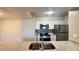 Kitchen with granite counters, a deep sink, and stainless steel appliances at 3038 Parkway Blvd # 204, Kissimmee, FL 34747